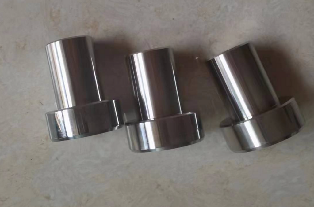 Machined jigs to allow tea kettle piston to cool and keep tolerances after molding