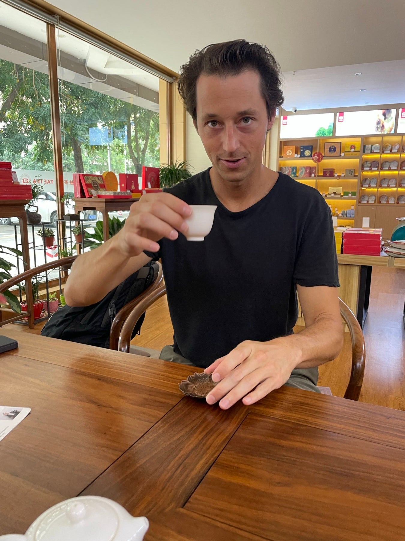 Christian drinking tea during a China manufacturing trip