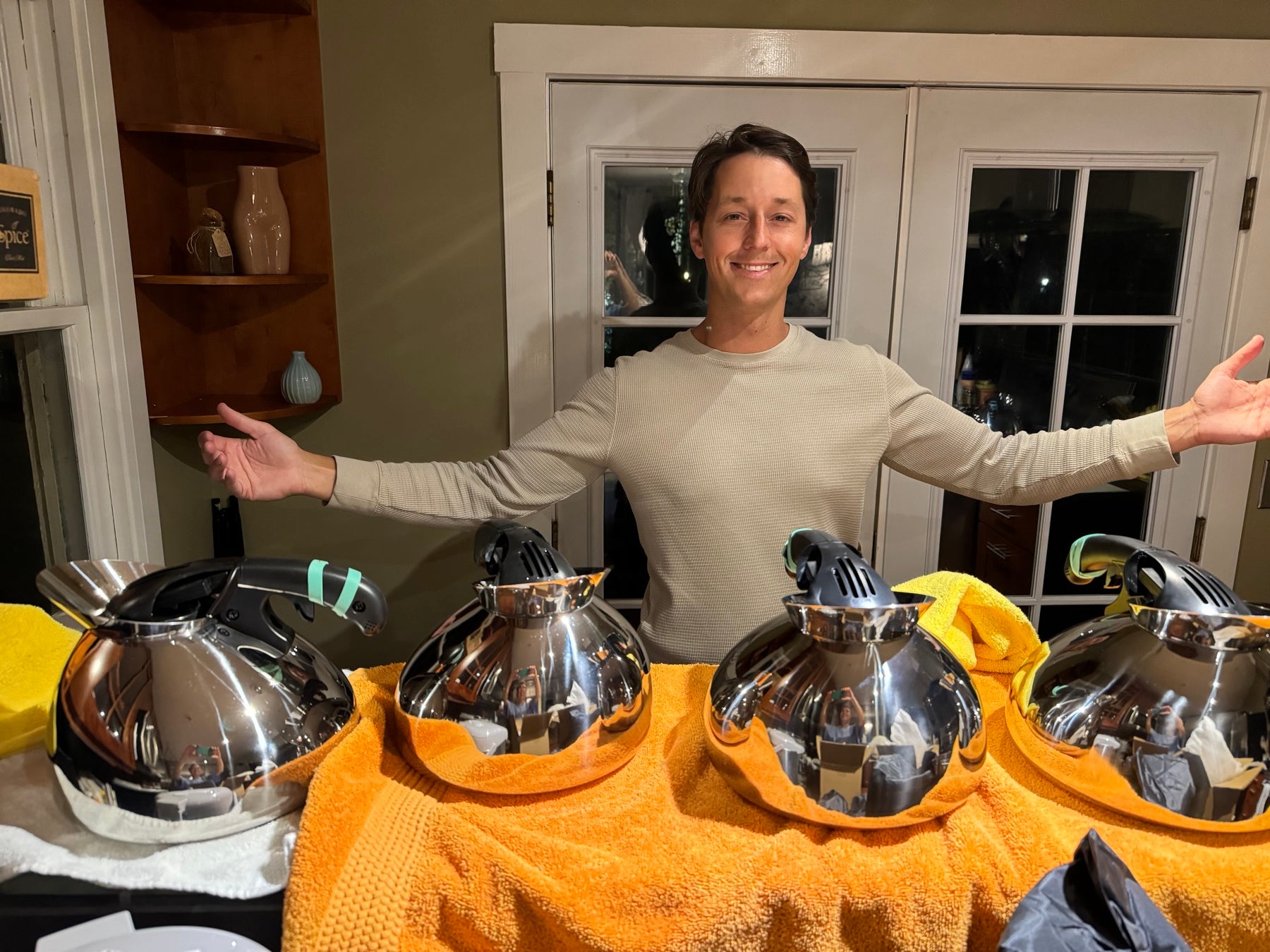 Christian preparing the first batch of Musical Tea Kettles for shipment