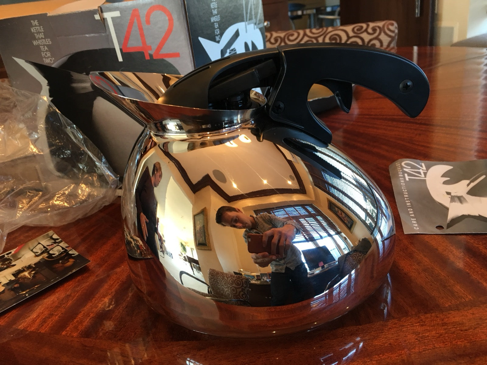 A polished Musical Tea Kettle sitting on a table